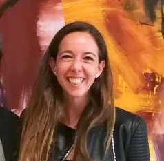 Carlota Pi, presidenta de Holaluz, durante una intervención pública en el Ayuntamiento de Madrid en 2018.