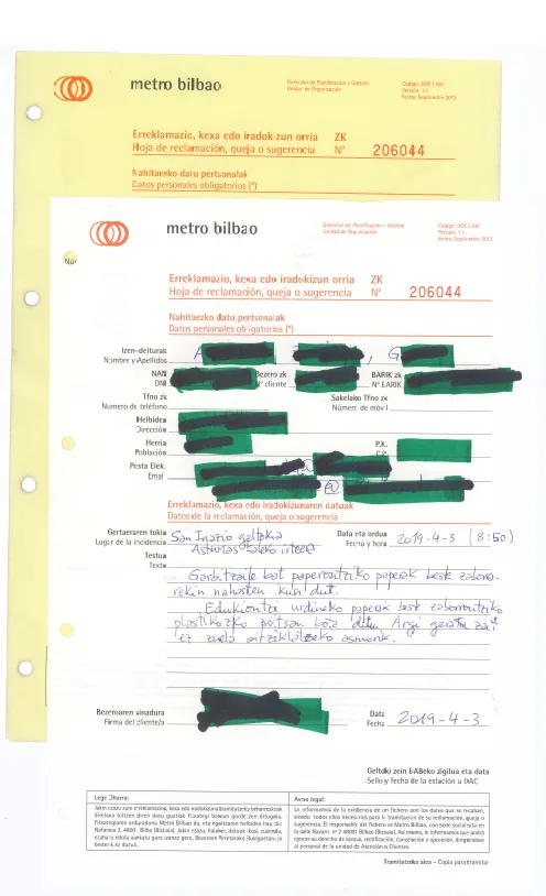 Hoja oficial de reclamaciones del Metro de Bilbao rellenada a mano, con tres copias por papel autocopiativo (administración, empresa y cliente).